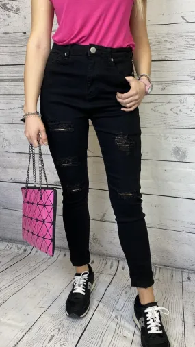 Jeans neri skinny a vita alta con effetto consumato