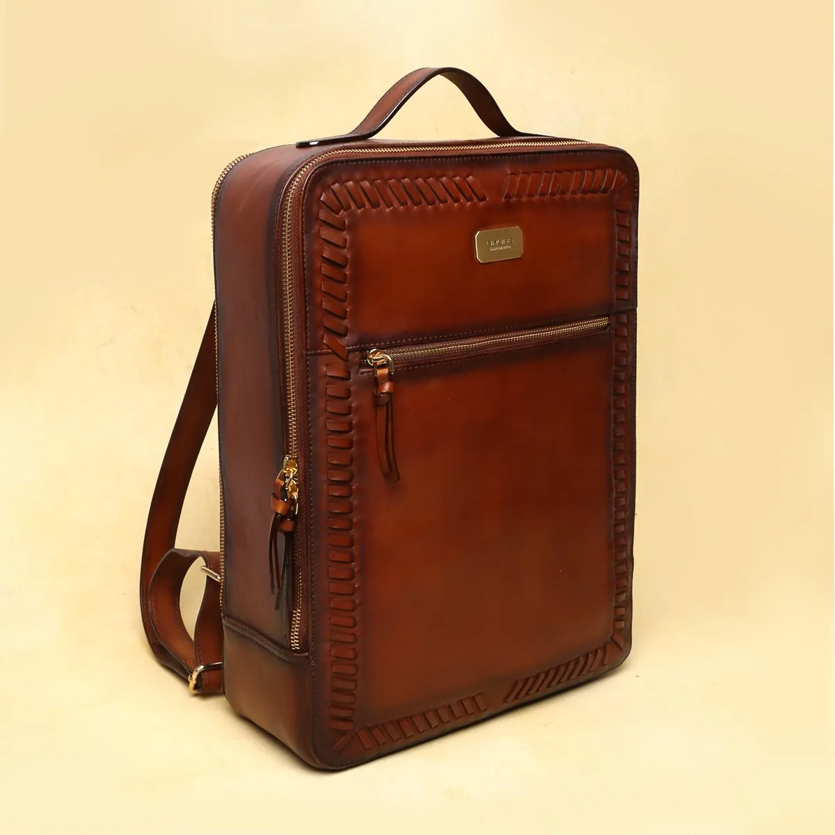 Tan Weaved Stripes Leather Backpack By Brune & Bareskin